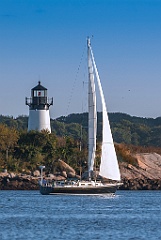 Sailboat by Ten Pound Island Lighthouse in Gloucester, MA